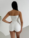 Unitard jumpsuit senza maniche con brillantini