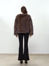 Cappotto peloso a righe screziate