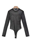 Body in tulle a paillettes con maniche lungo.