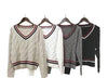 Maglia con motivi a trecce