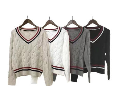 Maglia con motivi a trecce